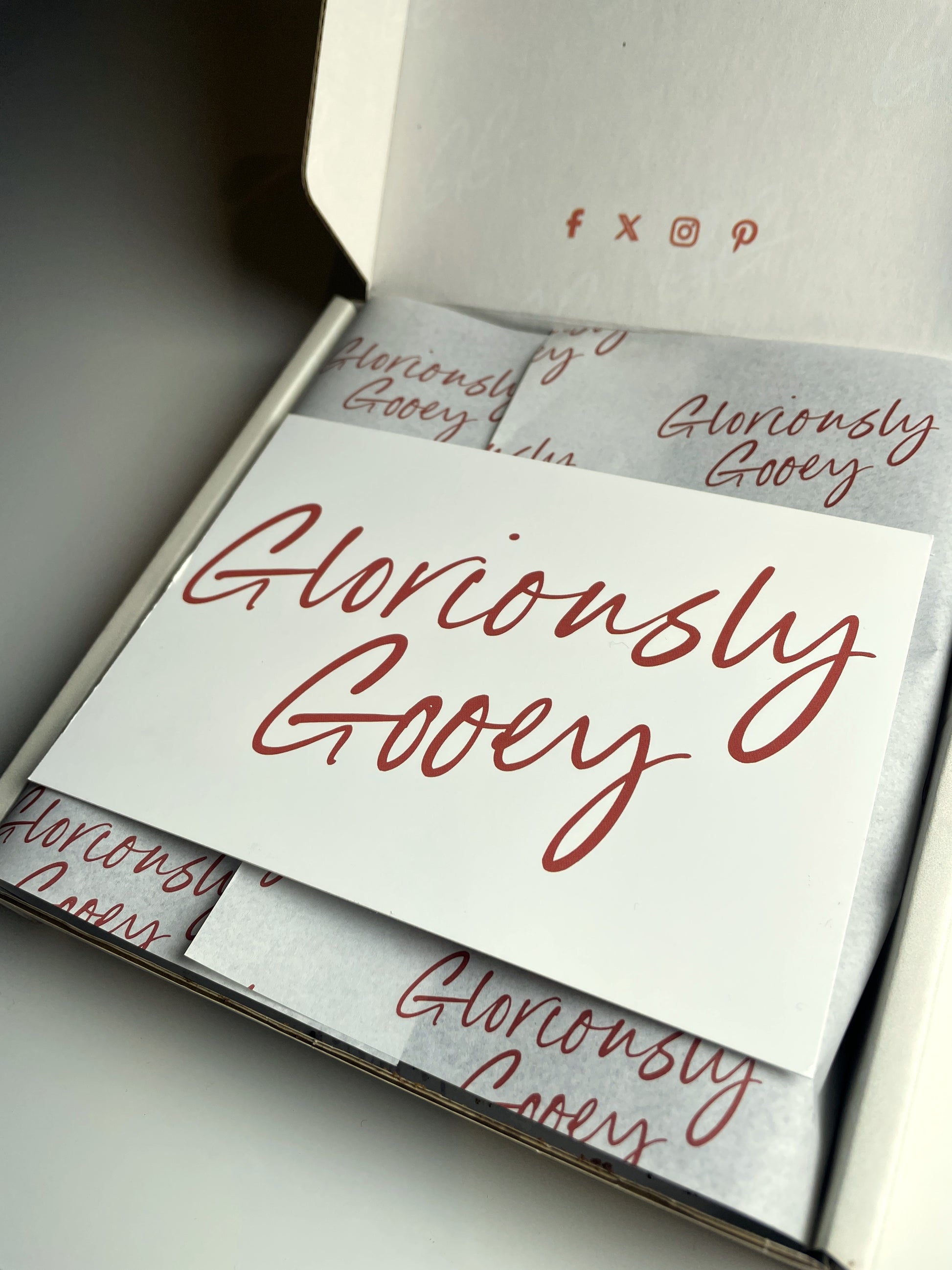 Gloriously Gooey brownie box with a handwritten note card for a personal touch